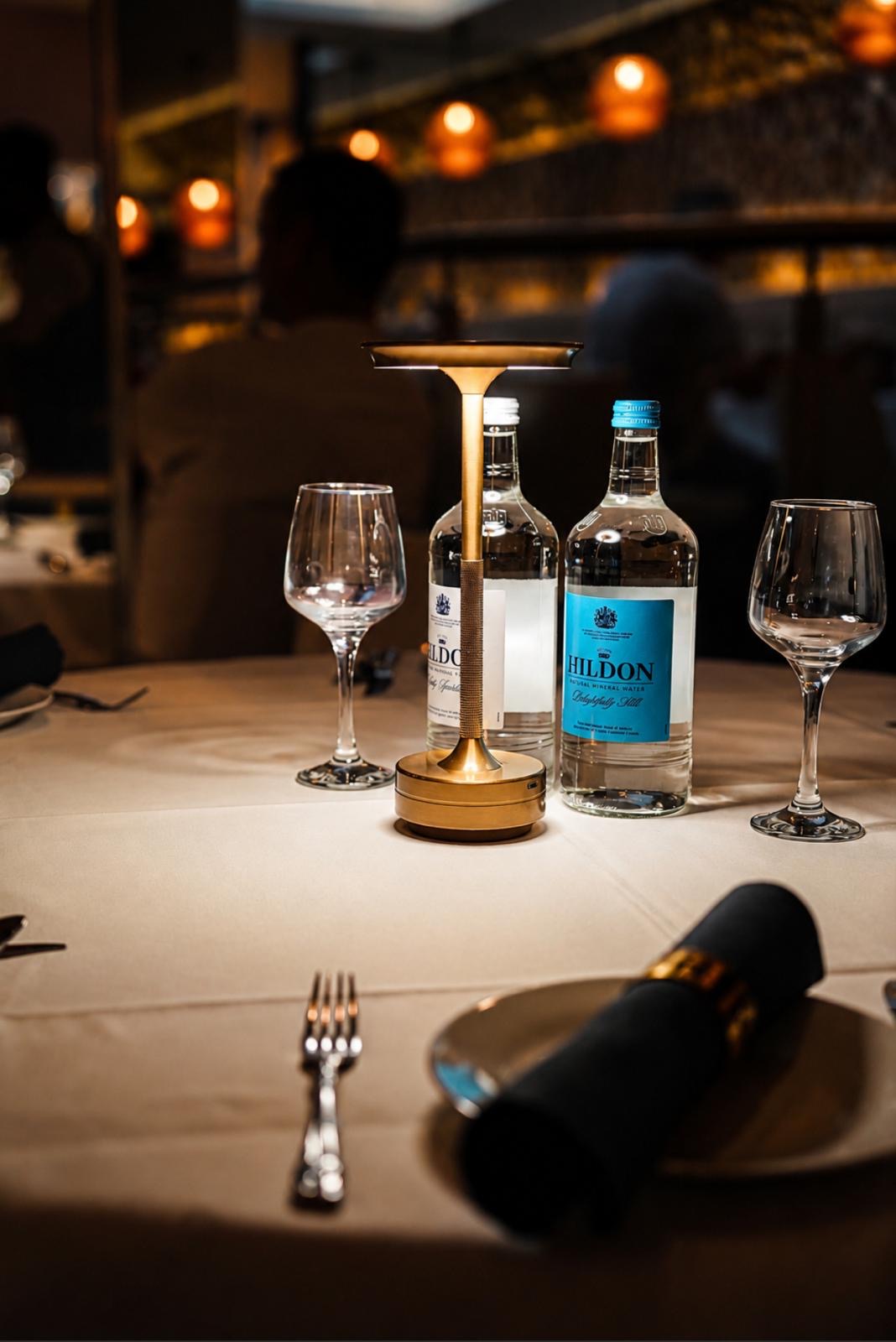 Refined table setting with warm ambient lighting